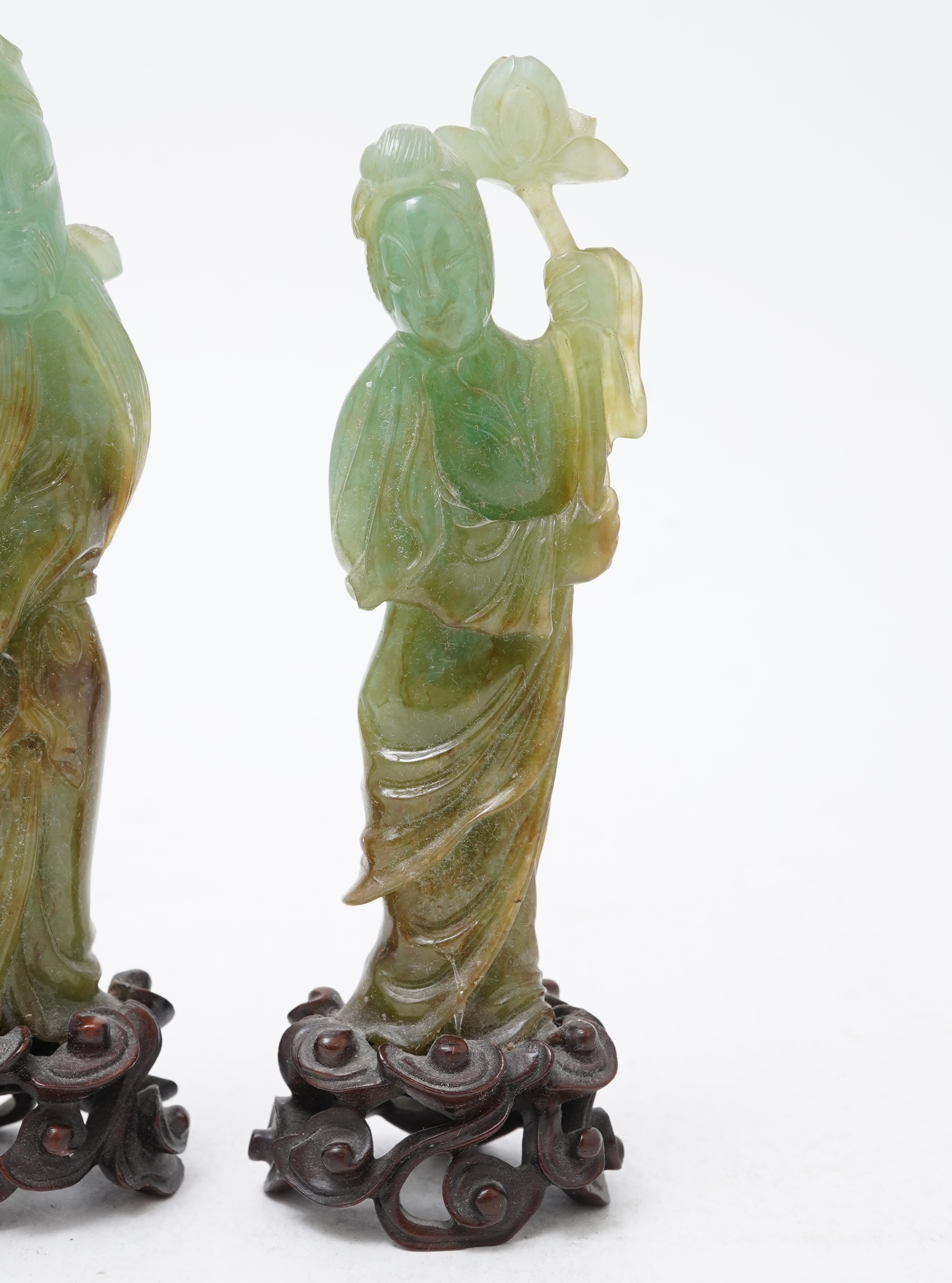 Possibly retailed by Cartier, a pair of Chinese jadeite figures, early 20th century